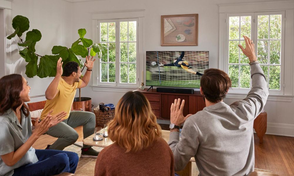 Sonos speakers on wooden console table
