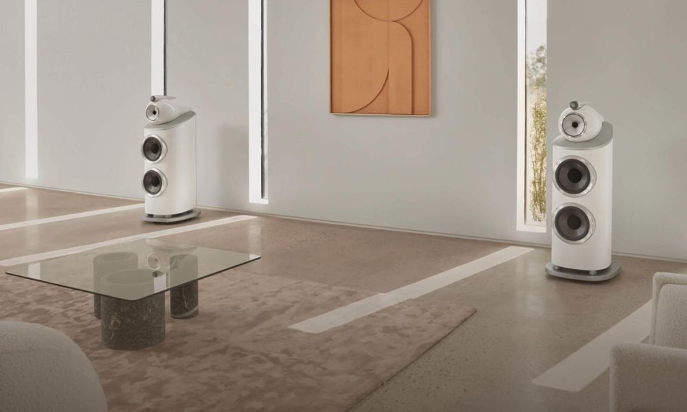 Bowers and Wilkins, large wooden speakers in room with white walls