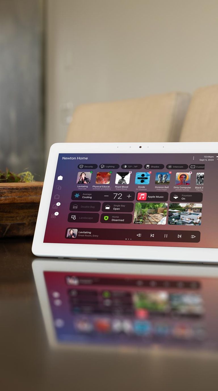 Smart home tablet showing connected devices and controls